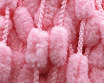 Bernat Baby Pompom-garn. Jag har 3 färger: grönt, roliga tryck och sockervaddsrosa.