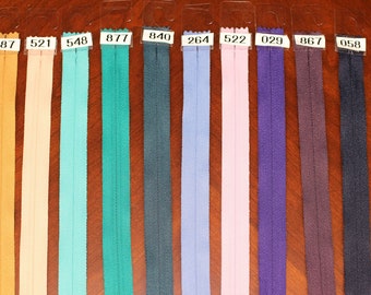 Zippers 22" regular.   All colors in stock.  YKK nylon #3 zipper for dresses.