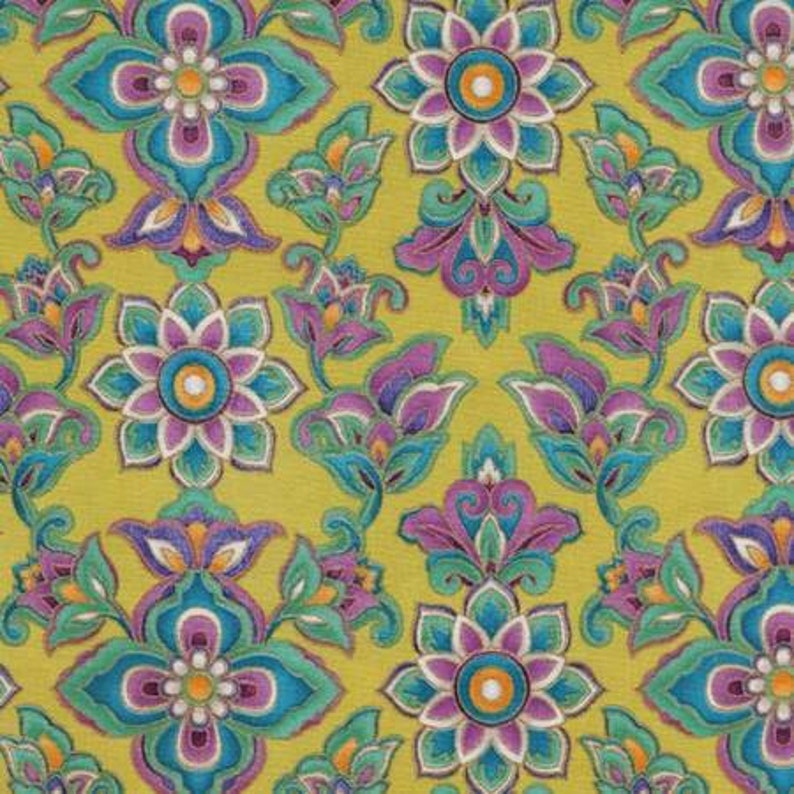 May include: A yellow fabric with a repeating pattern of teal, purple, and white flowers. The flowers have a circular centre and multiple petals.