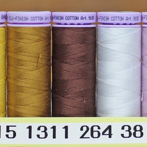SALE:  Mettler cotton thread.  Silk-finished cotton thread 50 weight solids 164 yard spools.