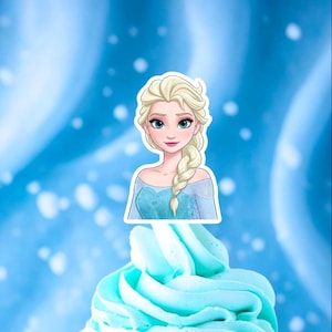 May include: A light blue cupcake topped with a cartoon image of Elsa from Frozen. Elsa has blonde hair in a braid, blue eyes, and a blue dress. The background is a gradient of light and dark blue.