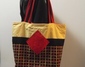 Plaid Quilted Tote with diagonal red pockets