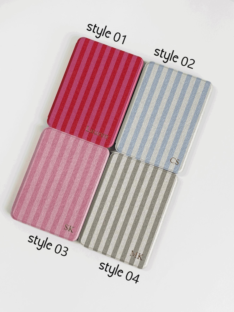 May include: Four rectangular cases with vertical striped patterns in red, pink, blue, and grey. Each case has a different initial or name printed on it. The text "style 01", "style 02", "style 03", and "style 04" are printed on the image.