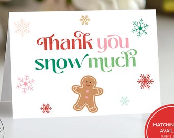 May include: A white folded card with the text "Thank you snow much" in red, pink, and green. The card features a gingerbread man and snowflake illustrations. The card also has the text "Try the demo in the listing description".