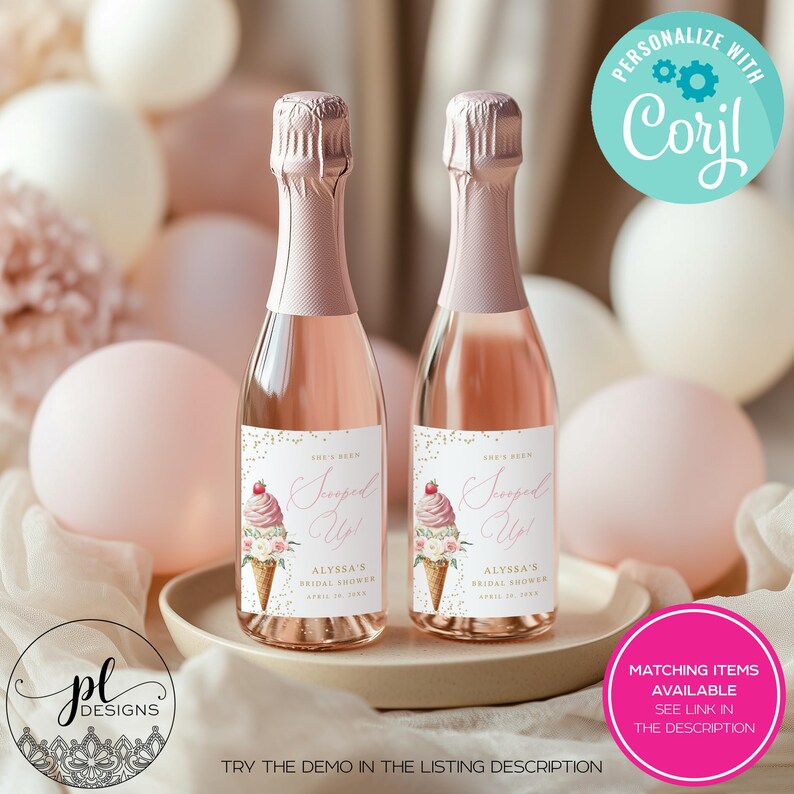 May include: Two mini champagne bottles with pink labels that read "Scooped Up!" with an ice cream cone graphic. The bottles are on a beige tray, surrounded by pink and white balloons. The text "Alyssa's Bridal Shower" is also on the label.