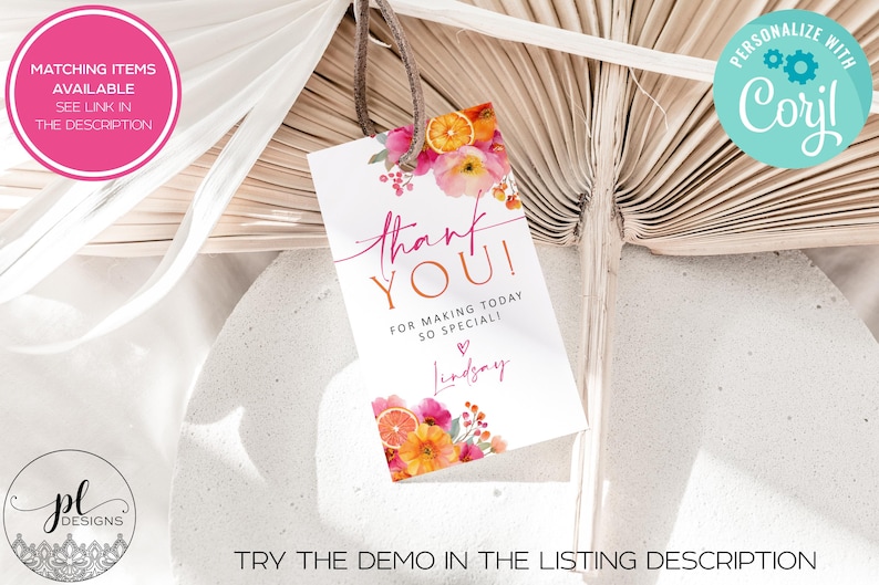 May include: A white gift tag with the words "thank YOU!" in pink and orange script, accented with floral and citrus illustrations. The tag includes the text "FOR MAKING TODAY SO SPECIAL!" and a name. A brown string is attached.