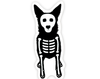 May include: A die-cut sticker featuring a black silhouette of a dog in a sitting position. The design includes a white skeletal rib cage pattern on the chest and a white skull-like mask covering the face, with black eye sockets and nose.