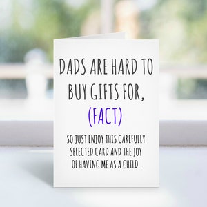 May include: A white greeting card with black text that reads "DADS ARE HARD TO BUY GIFTS FOR, (FACT)". Below, it says "SO JUST ENJOY THIS CAREFULLY SELECTED CARD AND THE JOY OF HAVING ME AS A CHILD."