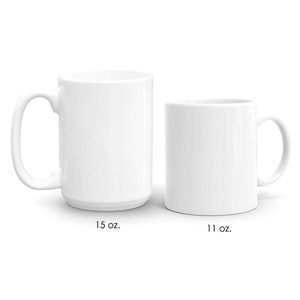 May include: Two white ceramic mugs, one is 15 ounces and the other is 11 ounces.
