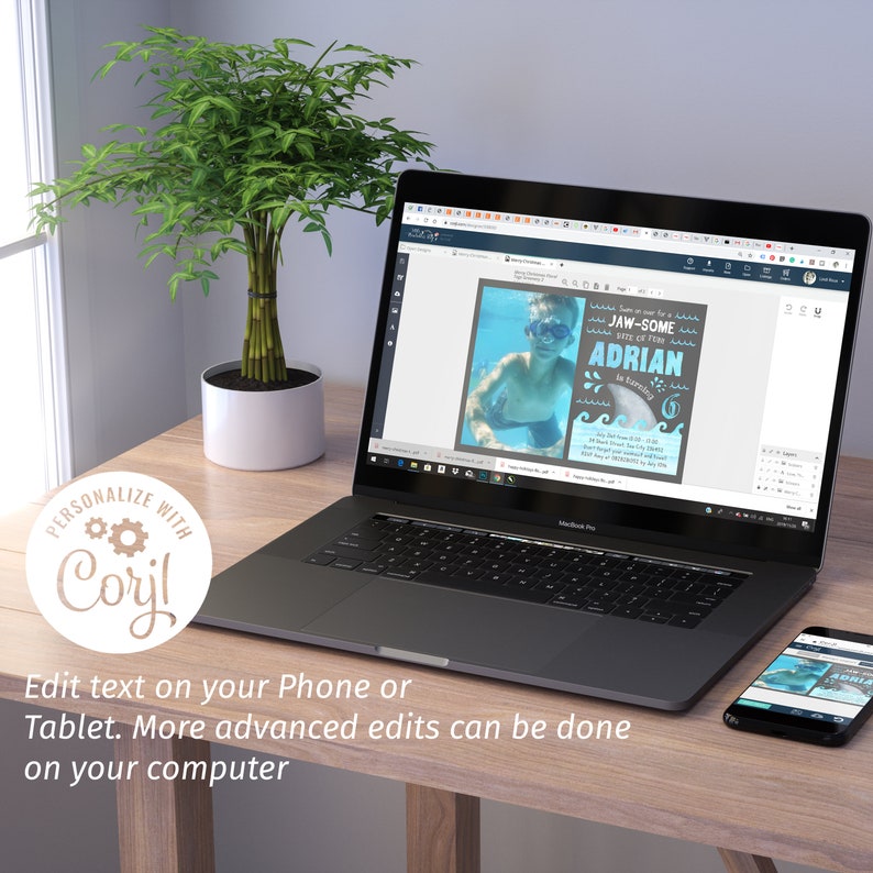 May include: A laptop and smartphone display a personalized invitation with the text "JAW-SOME" and "ADRIAN". The invitation features a photo of a person underwater. The laptop is on a wooden desk next to a potted plant. Text on the image says "Personalize with Corjl!"