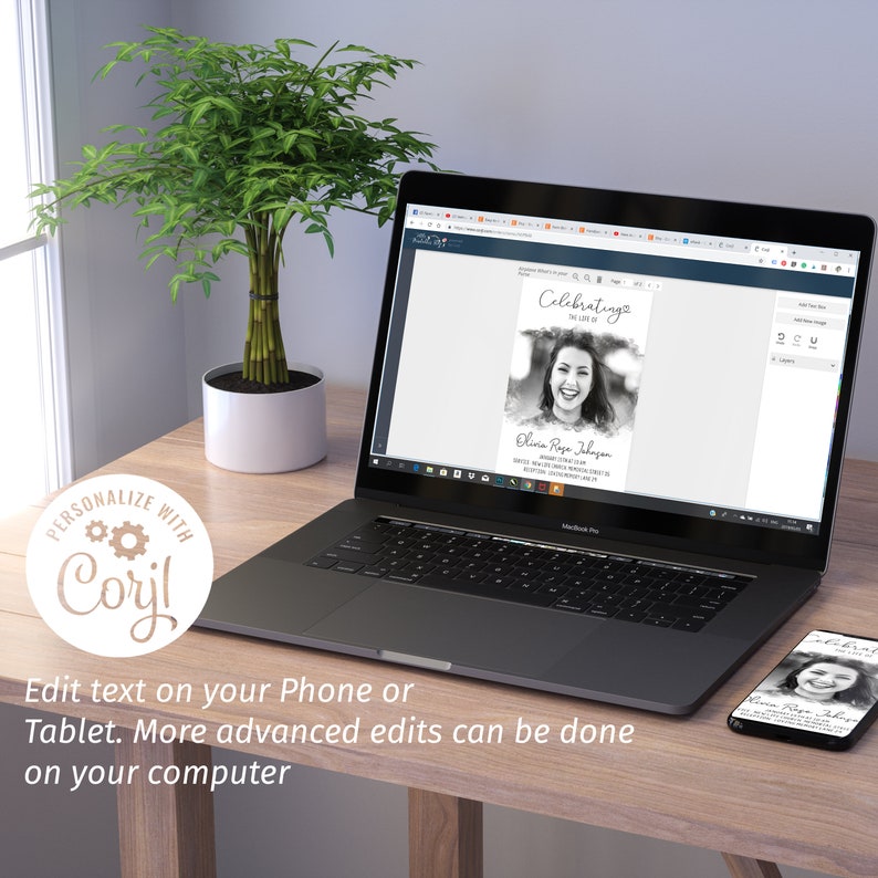 May include: A laptop and smartphone display a memorial template with a black and white photo and text. The laptop is open on a wooden desk next to a small potted plant. Text on the image reads "Celebrating the Life of Olivia Rose Johnson."