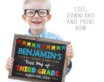 May include: A chalkboard sign with a wooden frame held by a child. The sign reads "BENJAMIN'S First day of THIRD GRADE" in colorful text, with the date "August 25th, 20XX" at the bottom. The sign also has a banner of colorful flags at the top. The text "EDIT, DOWNLOAD AND PRINT NOW" is also visible.