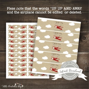 May include: Two sheets of printable labels with a vintage airplane theme. The labels feature red biplanes, white clouds, and the text "Up Up and Away." The text "A baby boy is on the way" is also included. The design is set against a tan background.