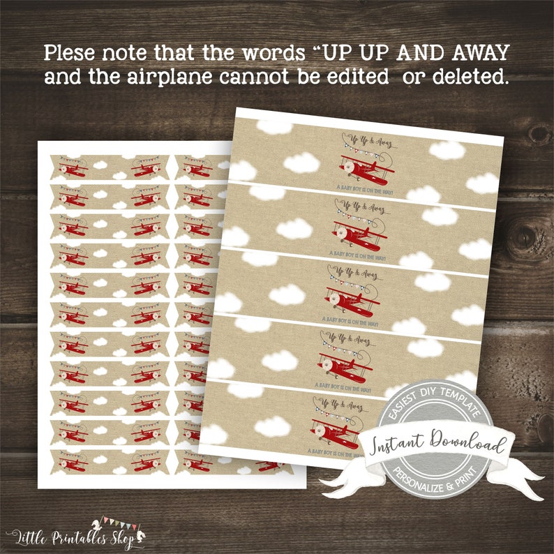 May include: Two sheets of printable labels with a vintage airplane theme. The labels feature red biplanes, white clouds, and the text "Up Up and Away." The text "A baby boy is on the way" is also included. The design is set against a tan background.