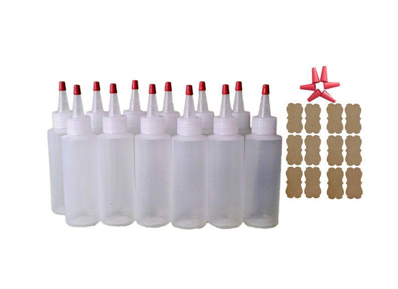 May include: Set of twelve clear plastic squeeze bottles with red caps and twelve brown paper labels. The bottles are 4 ounces each.