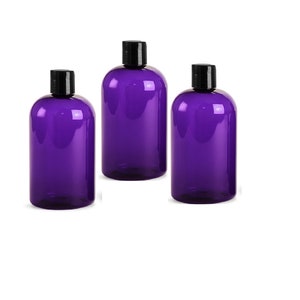 May include: Three purple plastic bottles with black screw-on caps. The bottles are empty and ready to be filled.