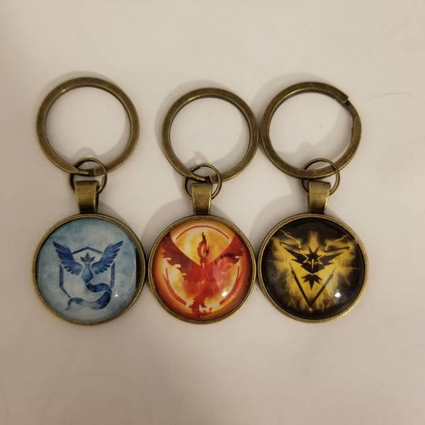 Pendant - Pokemon Go team mystic valor instinct necklaces or keychain - choose a style