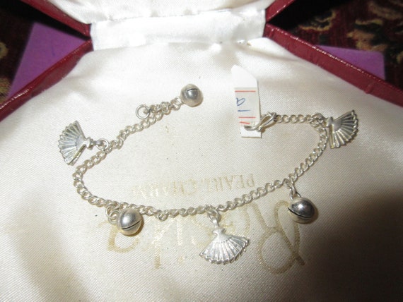 vintage silvertone charm bracelet with bells and little oriental fans