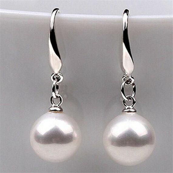 Beautiful silver plated 10 mm white high lustre seashell pearl stud earrings