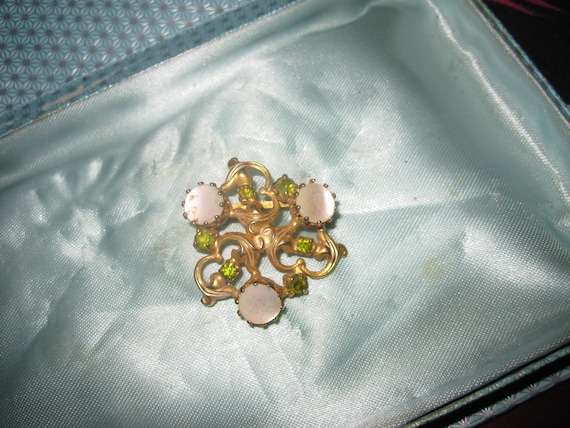 Lovely vintage unusual design gold plated brooch with mother of pearl and peridot  rhinestones