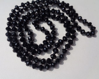 Beautiful vintage art deco knotted black glass bead necklace