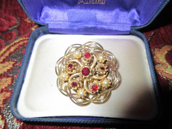 Lovely vintage goldtone ruby red glass rhinestone and seed pearl  filigree  brooch