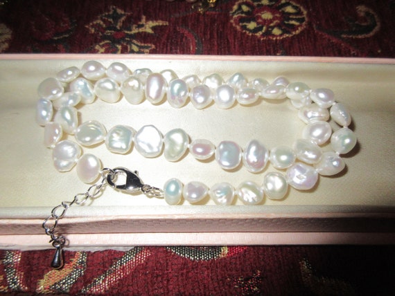 Beautiful high lustre olatinum white Keshi  pearl necklace