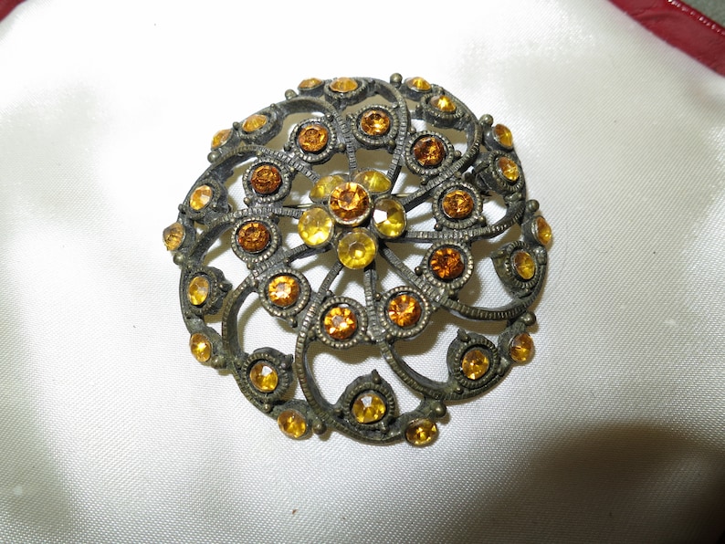 Fabulous Vintage large gold metal amber glass openwork brooch