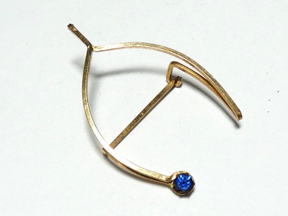 Lovely vintage Single Piece of Rolled Gold Wishbone & Blue Rhinestone brooch