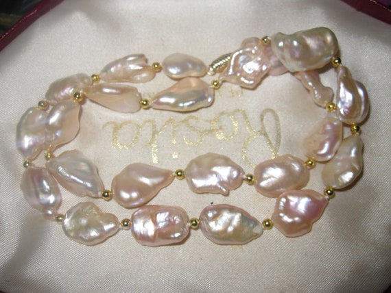 Lovely new creamy pink baroque Keshi   pearl necklace