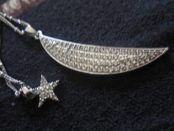 Lovely Park Lane silvertone rhinestone celestial moon and stars necklace