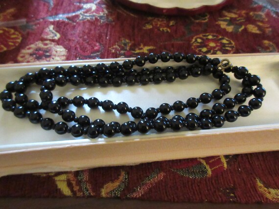 Lovely vintage long black glass necklace 36"