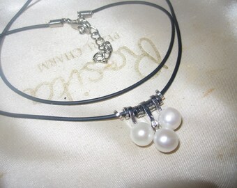 Lovely new black rubber necklace with 3 genuine white pearls