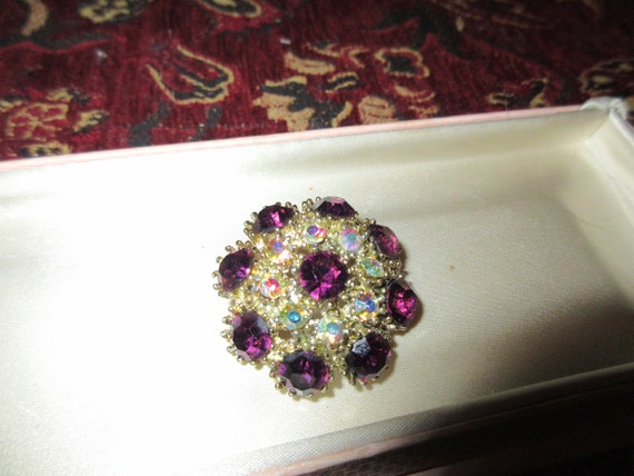 Lovely vintage goldplated purple and aurora borealis glass domed brooch