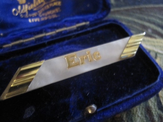 Beautiful vintage  goldtone pearly lucite " ERIC " bar brooch