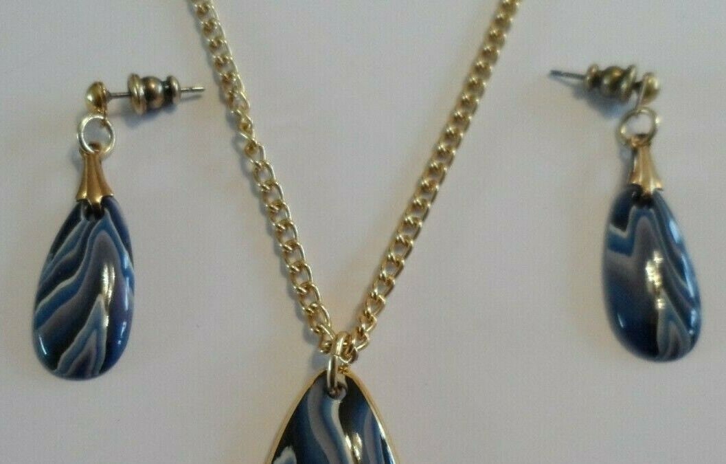 Silver Colored Necklace with Blue Stones and Matching Earrings