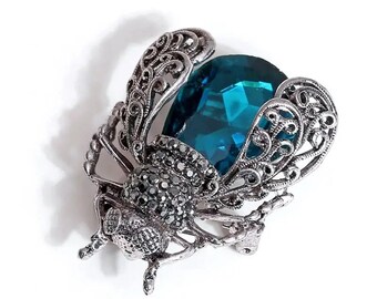 Wonderful Deco style silverplated blue glass bug brooch