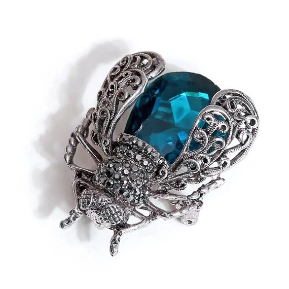 Wonderful Deco style silverplated blue glass bug brooch