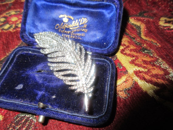 Lovely vintage Nouveau style rhinestone studded Feather brooch