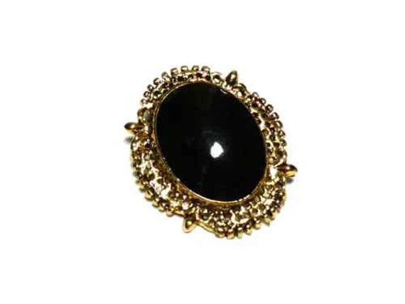 Lovely vintage goldplated filigree framed black glass Brooch