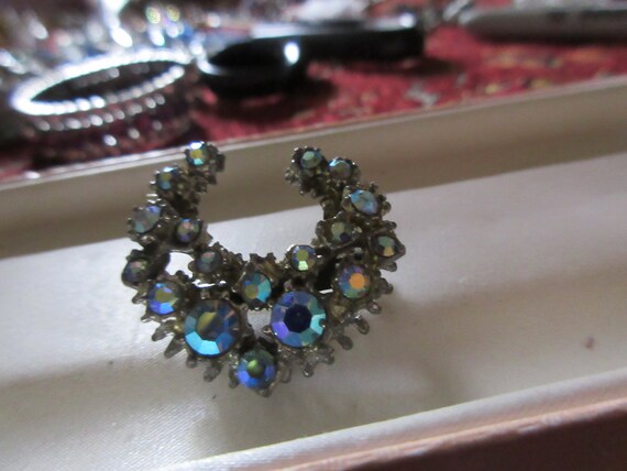 Lovely vintage silvertone green blue AB  rhinestone crescent brooch