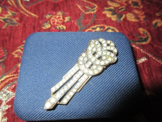 Lovely vintage Deco brass metal rhinestone dress clip