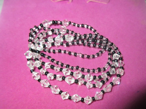 Lovely vintage black and clear glass facet cut bead necklace 30"