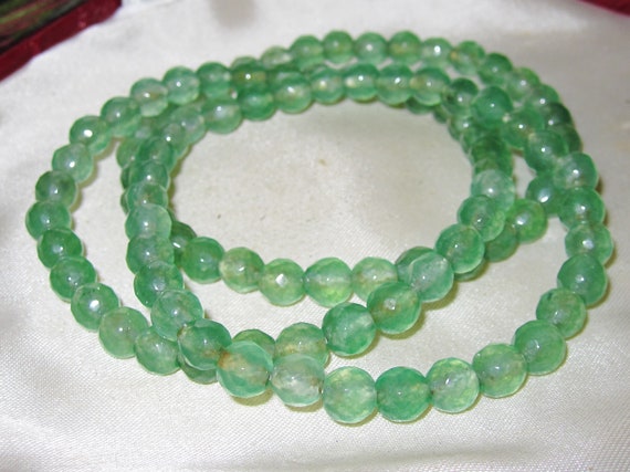 Lovely new natural faceted  6.5mm  jade bracelet