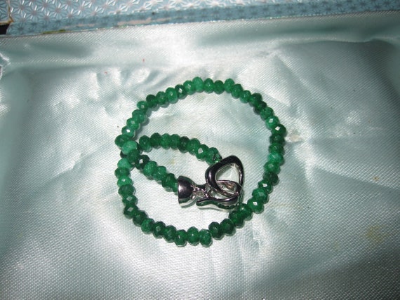 Lovely natural faceted 4mm emerald bracelet silverplated clasp. 7.5 inches