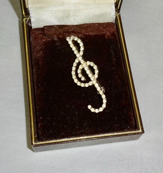 Beautiful vintage Silvertone treble clef rhinestone  Musical brooch