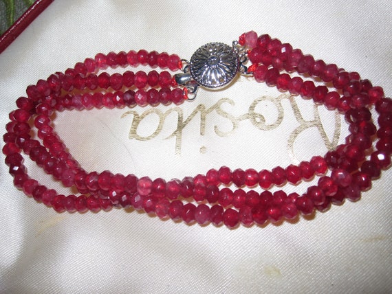 Lovely sparkly 3 strand 4mm natural ruby bracelet 7.5"