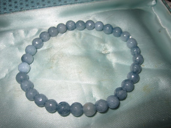 Lovely faceted 6.5mm Brazilian aquamarine stretch bracelet 7.5"