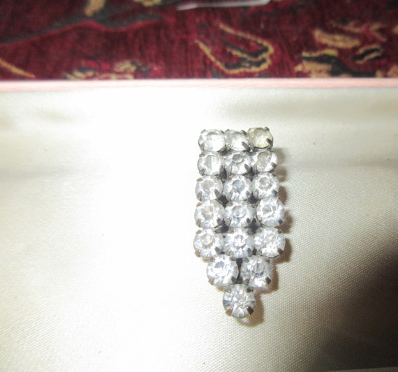 Lovely vintage Deco metal rhinestone dress clip or brooch