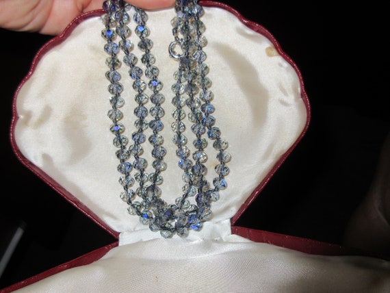 Beautiful knotted faceted grey and blue iridiscent  aurora borealis glass necklace 28"